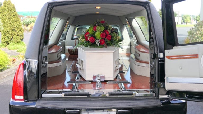 A hearse is a vehicle arranged for transporting the deceased